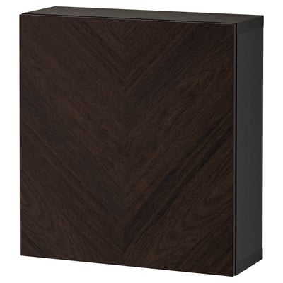 An IKEA BESTÅ dark brown wooden storage unit. Its rectangular, with a chevron-patterned wood grain finish and sleek, modern design.