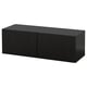 A black rectangular storage unit. Its sleek and minimalist with two doors. The smooth surface and modern style make it suitable for various spaces.