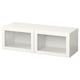 An IKEA BESTÅ white rectangular storage unit with two open compartments and no doors.