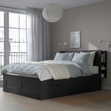 BRIMNES Bed frame w storage and headboard, black/Luröy, Queen