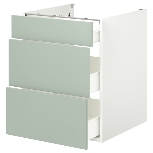 Modern kitchen cabinet with 3 light green drawers, white frame.
