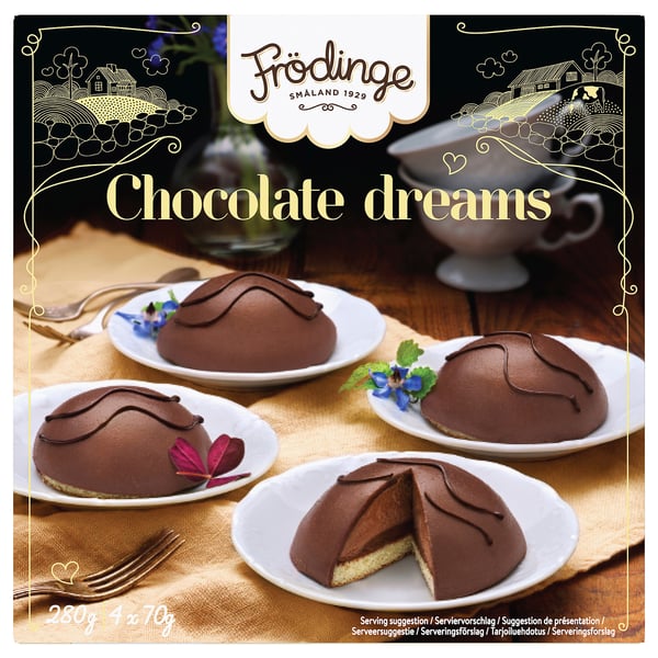Image FRÖDINGE chocolate dreams desserts on plates with forks. One dessert is cut, revealing interior.