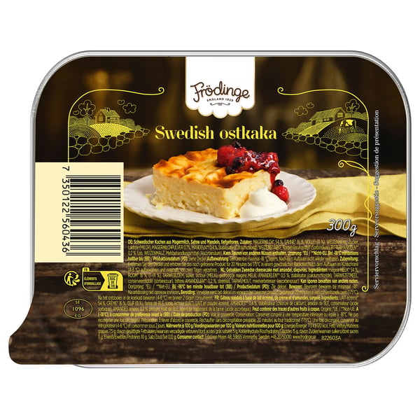 FRÖDINGE swedish ostkaka packaging. Dessert on plate. Golden label with farm graphics.