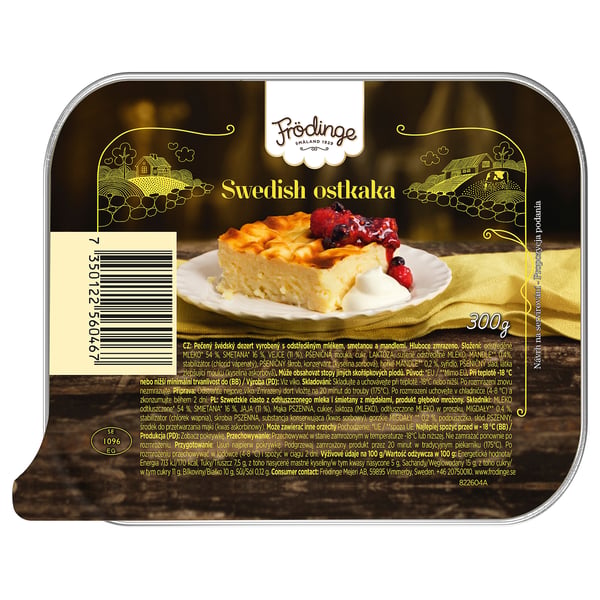 FRÖDINGE swedish cheesecake packaging. Displays a slice of cheesecake with berries on a yellow cloth.