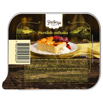 FRÖDINGE swedish cheesecake packaging. Displays a slice of cheesecake with berries on a yellow cloth.