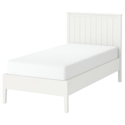 A white GULLABERG bed with a headboard featuring vertical grooves, sturdy solid wood legs, and a clean, elegant design.