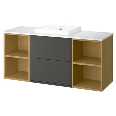 A modern wall-mounted bathroom vanity called HAVBÄCK in dark grey and oak with a white countertop and square bowl sink.