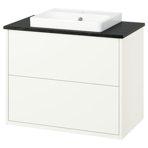 HAVBÄCK bathroom unit: white, rectangular cabinet with black countertop, rectangular sink. Modern, clean design.