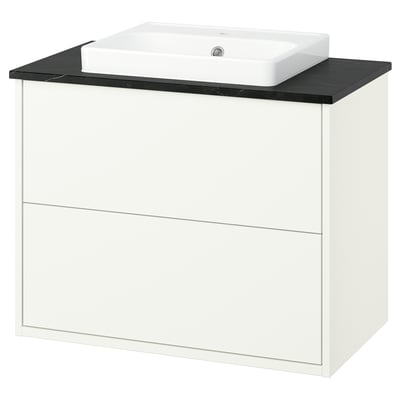 HAVBÄCK bathroom unit: white, rectangular cabinet with black countertop, rectangular sink. Modern, clean design.