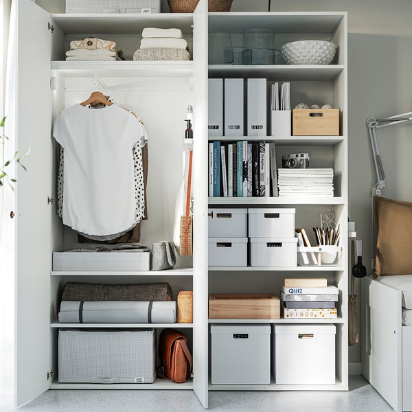 Organised closet with shelves, storage bins, clothes, and books. Adjustable feet ensure stability.