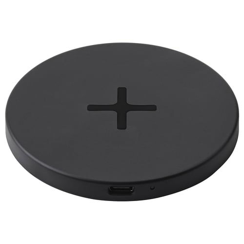Black round LIVBOJ wireless charging pad with usb-c port, sleek design, polycarbonate and abs plastic, portable.
