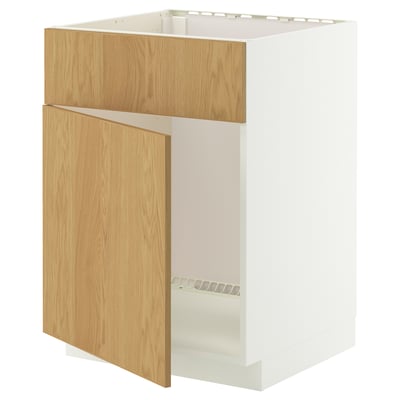 An IKEA METOD kitchen cabinet. It is white with a light wood door, featuring a clean, minimalist design.