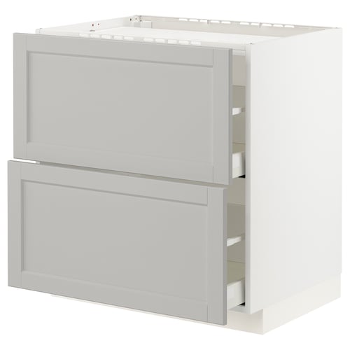 White METOD kitchen cabinet with bevelled light grey lerhytten drawers.