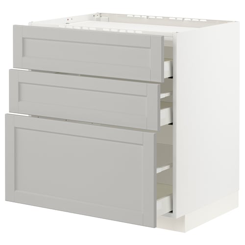 Modern white METOD kitchen cabinet with three large drawers.