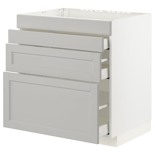 A light grey METOD kitchen cabinet with traditional bevelled edges and three drawers.