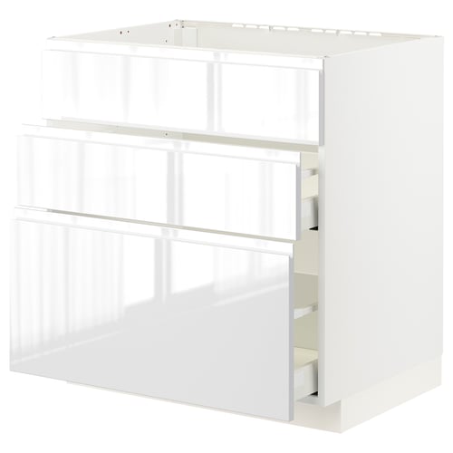 White ikea METOD kitchen cabinets with glass doors and smooth drawers, modern design.