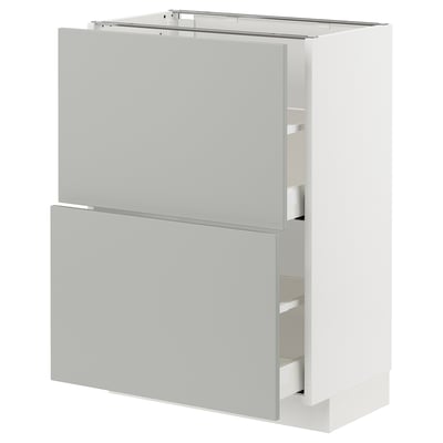 Modern kitchen cabinet in light grey with sleek design, featuring two drawers and a door for storage.