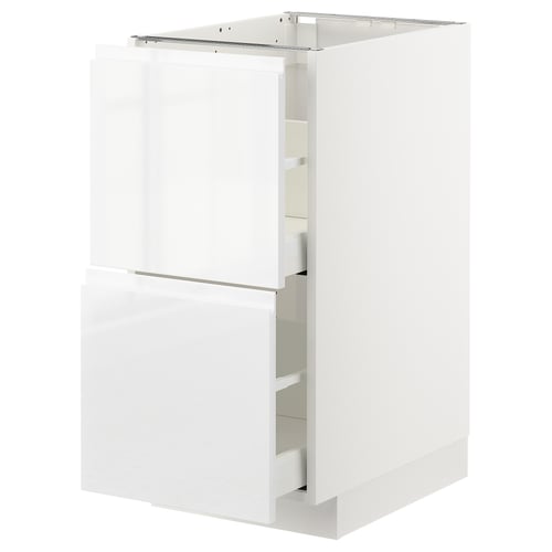 White high-gloss kitchen cabinet with drawers and shelves.