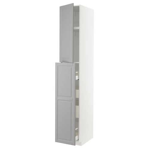 A METOD kitchen cabinet in soft grey with bevelled edges, featuring two pull-out shelves behind the doors.