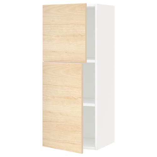White METOD wall cabinet with light ash wooden doors and adjustable shelves.