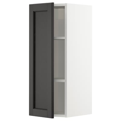 A white METOD kitchen cabinet with a single black stained wooden door featuring bevelled edges. It has an internal shelf and a modern design.