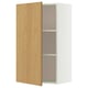 White IKEA METOD cabinet with light wood door and nickel hinges.