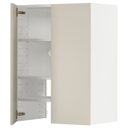 A beige METOD kitchen cabinet with two open doors revealing adjustable shelves.