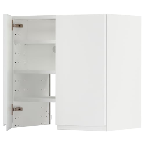 A white METOD kitchen cabinet with adjustable shelves and reversible doors.
