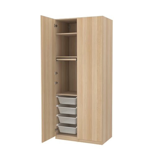 Light wood PAX wardrobe with open doors, shelves, and storage baskets.
