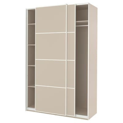 A beige ikea PAX wardrobe with sliding doors and internal shelves.