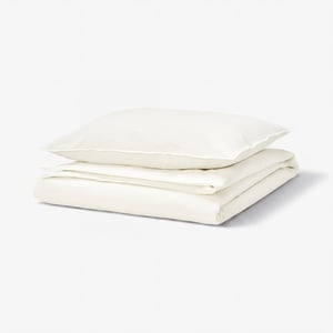 RUNDHAGTORN white duvet set, neat stack of folded white cotton-linen blend, rectangle, clean look.