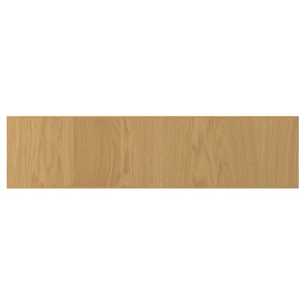 A light wood-colored rectangular shelf, made of oak veneer and particleboard, with a solid oak edge.