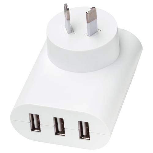 A white, compact usb charger with three ports.