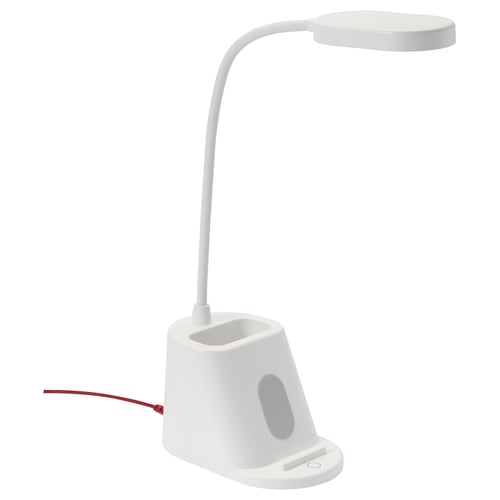 The SPANNLAND desk lamp in white. The sleek design includes a flexible arm and built-in pen holder for convenience.