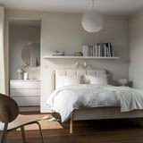 TÄLLÅSEN Upholstered bed frame with mattress, Kulsta light beige/Vesteröy extra firm, Double