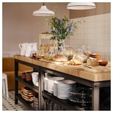 VADHOLMA Kitchen island, black/oak, 126x79x90 cm