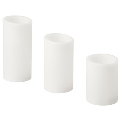 Three white led block candles of varying heights, sleek, cylindrical design, modern and minimalist.