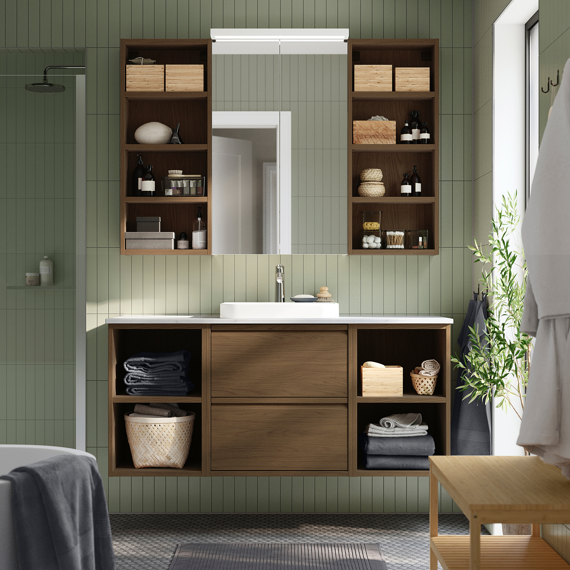 Modern bathroom setup: ÄNGSJÖN unit, green. Wooden storage, white marble basin, mirrored cabinet.