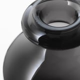 Dark glass vase, smoothly curved, handcrafted with precision.