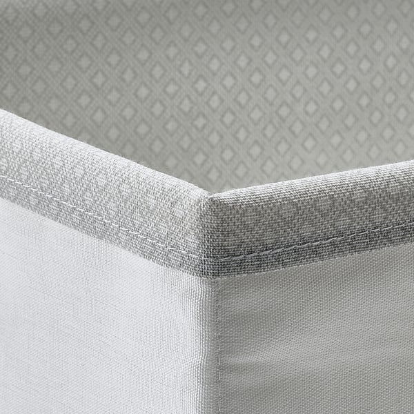 BAXNA: gray fabric organizer, recycled polyester, corner detail, textured lid, neat stitching.