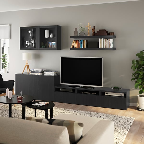 Modern living room with BESTÅ tv unit, flat screen, sofa, and coffee table.