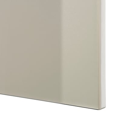 Close-up of clean-lined, white BESTÅ cabinet panel, showing smooth, high-quality finish.