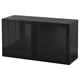 Depicts a sleek black glass and metal cabinet with two doors. The design is modern and minimalist, ideal for storage in contemporary spaces.