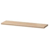 An ikea BESTÅ adjustable wooden shelf. It is rectangular, light brown, and made of particleboard with plastic edging.