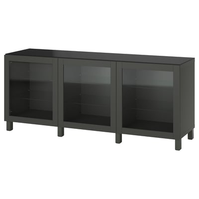 Black BESTÅ sideboard, 3 glass-door storage units. Modern, rectangular design with adjustable shelves.