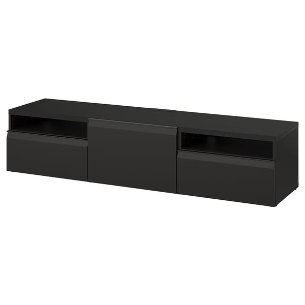 Black rectangular BESTÅ tv bench with three compartments and two drawers, sleek and modern design.