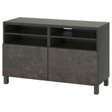 Modern black tv stand, BESTÅ series, with shelves and cabinet doors for storage, featuring clean lines and minimalist design.