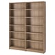 A BILLY bookshelf in light brown. Its rectangular with six empty shelves, made of particleboard and fiberboard.