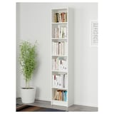 White BILLY bookshelf with books and plant.