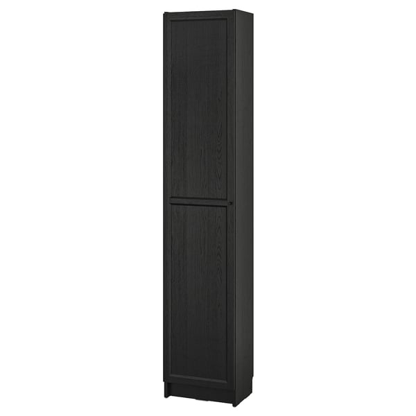 A tall, dark BILLY bookshelf with one panel door, made of particleboard and fiberboard, standing upright.